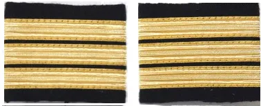 Paire d’épaulettes d’officier pilote de ligne, trois galons dorés sur fond noir